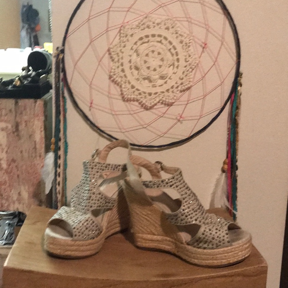 Aldo off white w/rhinestones 5” wedge shoes.